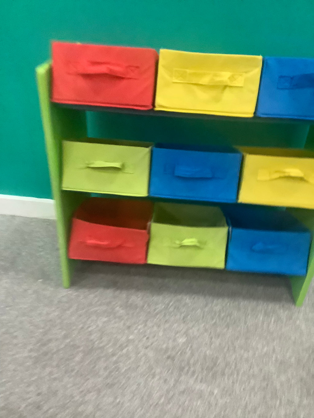 green 3-tier children's storage unit features nine colorful, removable fabric boxes with handle loops for organizing toys and books 190826002