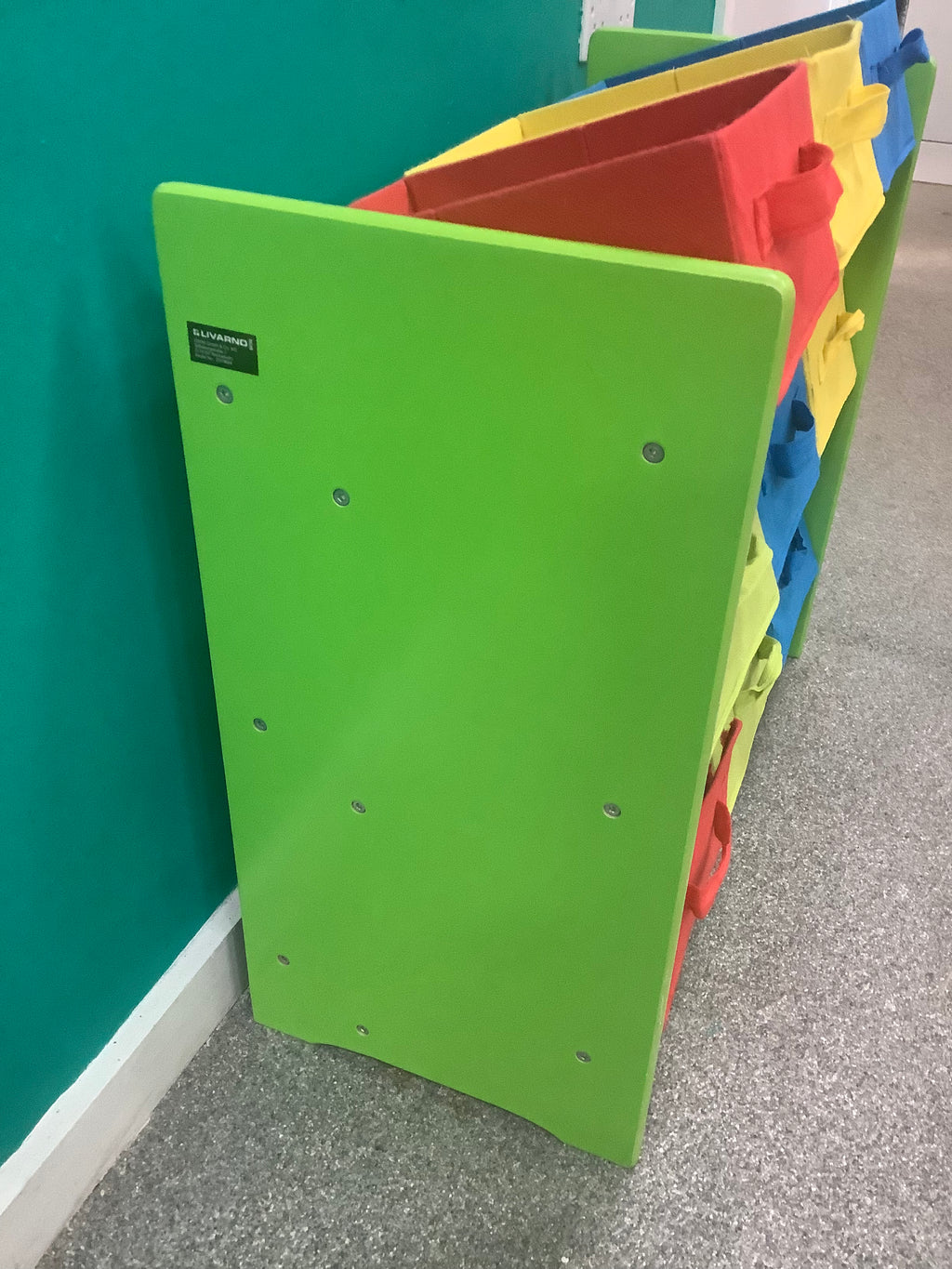 green 3-tier children's storage unit features nine colorful, removable fabric boxes with handle loops for organizing toys and books 190826002