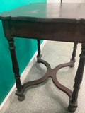 dark wood side table features a scalloped rectangular top, ring-and-baluster turned legs, and a serpentine X-stretcher base ending in ball feet 210826005