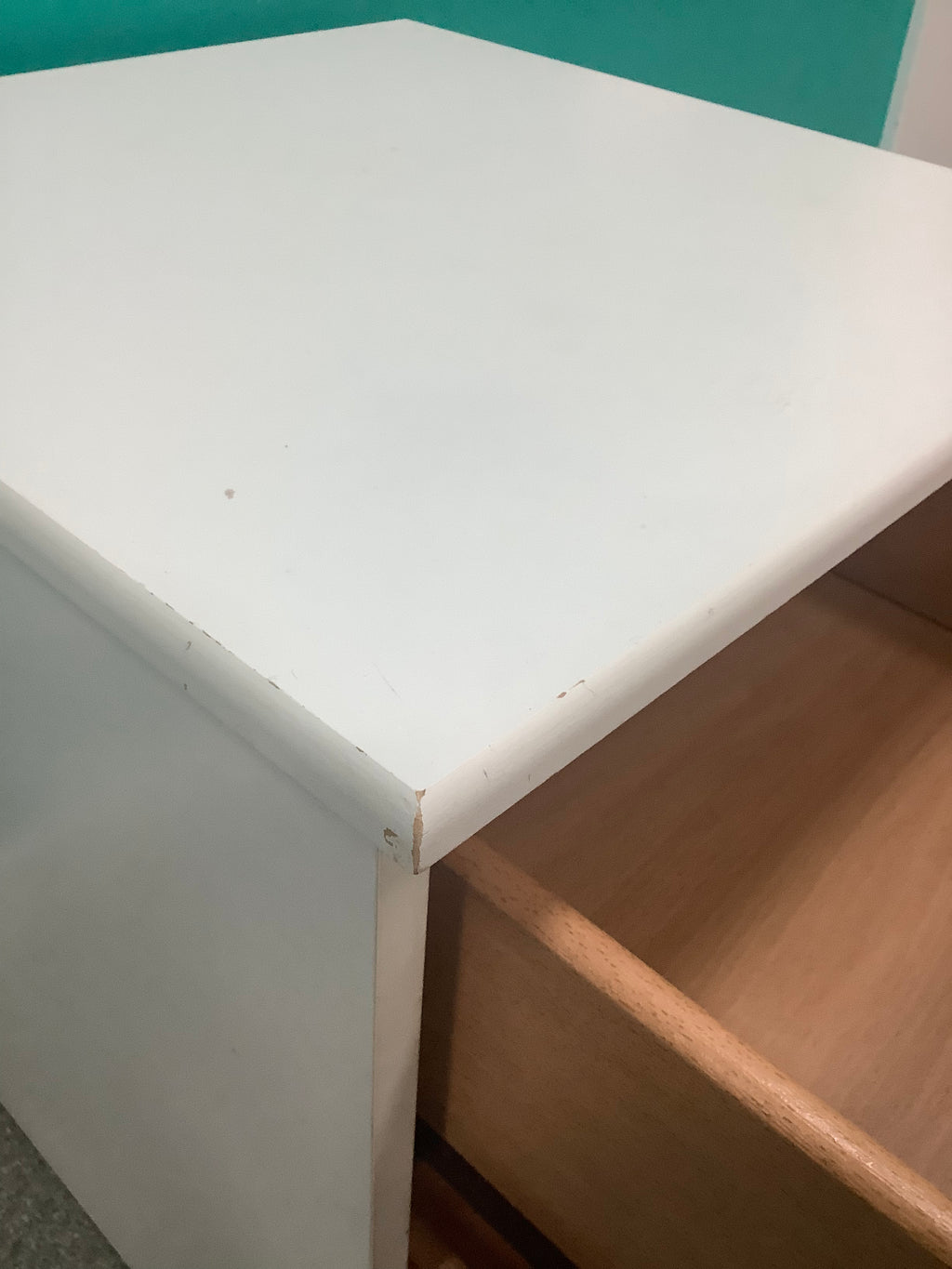 white 2-drawer bedside locker shown is a traditional freestanding nightstand featuring recessed drawer panels and round metal knobs. 210826006