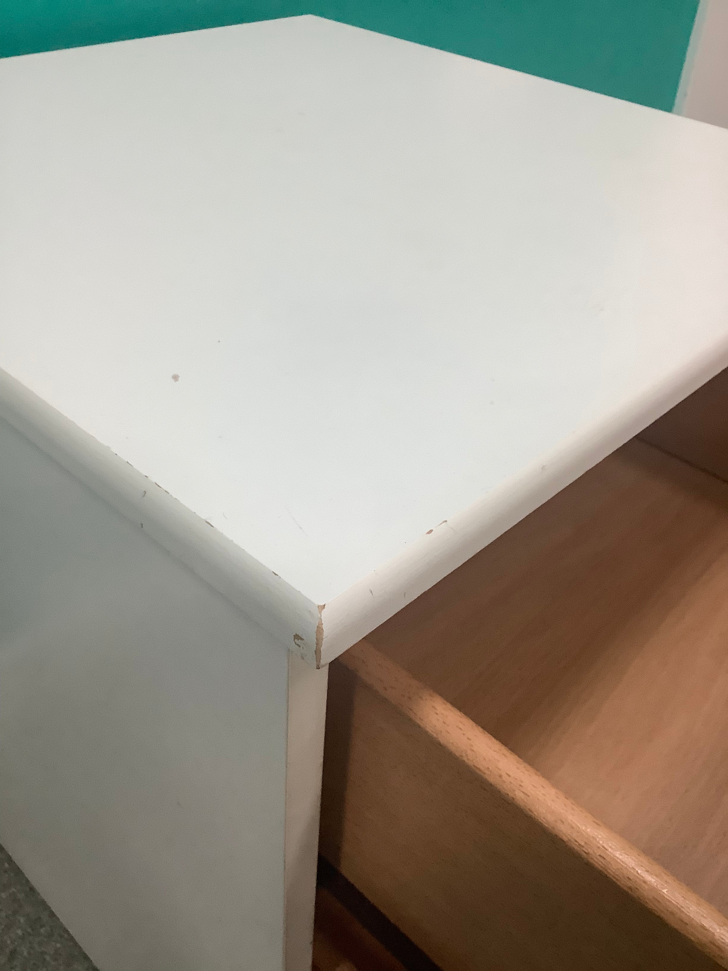 white 2-drawer bedside locker shown is a traditional freestanding nightstand featuring recessed drawer panels and round metal knobs. 210826006